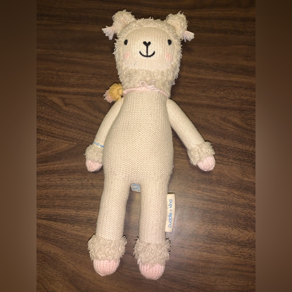 Cuddle and kind Lola the llama